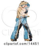 Strong Cowboy Wrapping A Beautiful Cowgirl In His Arms While Embracing Her In A Kiss