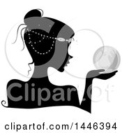 Clipart Of A Black Silhouetted Profiled Woman Wearing Head Beads And Holding A Crystal Ball Royalty Free Vector Illustration by BNP Design Studio