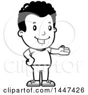 Clipart Of A Retro Black And White African American Boy Presenting Royalty Free Vector Illustration