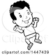 Clipart Of A Retro Black And White African American Boy Jumping In Shorts Royalty Free Vector Illustration