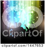 Clipart Of A Group Of Silhouetted Dancers Against Colorful Lights Stars And Flares Lights Royalty Free Vector Illustration