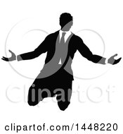 Poster, Art Print Of Black And White Silhouetted Business Man Kneeling And Worshipping