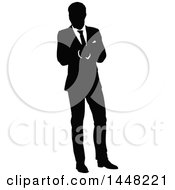 Clipart Of A Black And White Silhouetted Business Man Royalty Free Vector Illustration