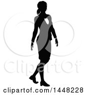 Clipart Of A Black And White Silhouetted Business Woman Walking Royalty Free Vector Illustration