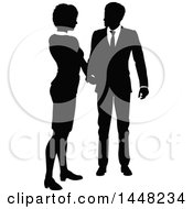 Clipart Of A Black And White Silhouetted Business Woman And Man Shaking Hands Royalty Free Vector Illustration