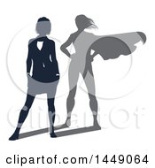 Silhouetted Business Woman With A Super Hero Shadow