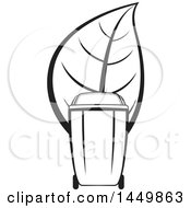 Clipart Graphic Of A Black And White Yard Debris Trash Bin With A Leaf Royalty Free Vector Illustration by Lal Perera