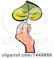 Poster, Art Print Of Hand Holding A Green Leaf