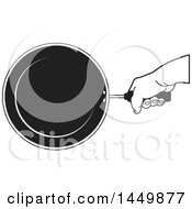Clipart Graphic Of A Black And White Hand Holding A Frying Pan Royalty Free Vector Illustration