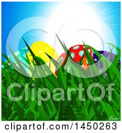 Poster, Art Print Of Colorful Easter Eggs In Grass Under A Blue Sunny Sky