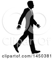 Clipart Graphic Of A Black And White Silhouetted Business Man Walking Royalty Free Vector Illustration