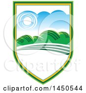 Clipart Graphic Of A Sunny Landscape With Hills And White Text Space In A Shield Royalty Free Vector Illustration by Vector Tradition SM