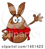 Clipart Graphic Of A Cartoon Bunny Eared Chocolate Egg Mascot Waving Royalty Free Vector Illustration