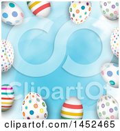 Border Of Colorful Patterned Easter Eggs Over Blue Watercolor