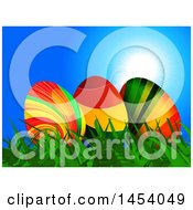 Poster, Art Print Of Trio Of 3d Colorful Striped Easter Eggs In Grass Against Blue Sky