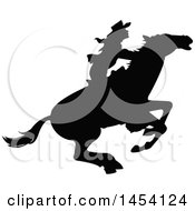 Poster, Art Print Of Black Silhouetted Horseback Rodeo Cowboy On A Bucking Bronco