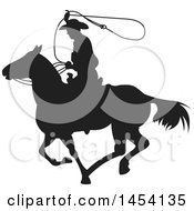 Clipart Graphic Of A Black Silhouetted Horseback Rancher Cowboy Swinging A Lasso Royalty Free Vector Illustration by Pushkin