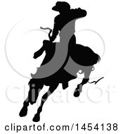 Poster, Art Print Of Black Silhouetted Horseback Rodeo Cowboy On A Bucking Bronco