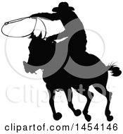 Poster, Art Print Of Black Silhouetted Horseback Rancher Cowboy Swinging A Lasso