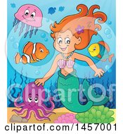 Clipart Of A Cartoon Red Haired Mermaid With Sea Creatures Royalty Free Vector Illustration by visekart