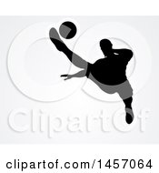 Clipart Of A Black Silhouetted Male Soccer Player Kicking Over Light Gray Royalty Free Vector Illustration