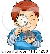 White School Boy Studying A Rock With A Magnifying Glass