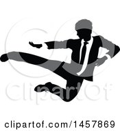 Poster, Art Print Of Black And White Silhouetted Business Man Kicking