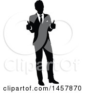 Clipart Of A Black And White Silhouetted Business Man Giving Two Thumbs Up Royalty Free Vector Illustration