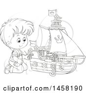 Poster, Art Print Of Black And White Boy Kneeling And Playing With A Toy Boat