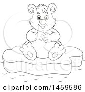 Clipart Of A Black And White Happy Polar Bear Sitting On Ice Royalty Free Vector Illustration by Alex Bannykh