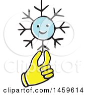 Clipart Of A Yellow Pop Art Styled Hand Holding A Snowflake Royalty Free Vector Illustration
