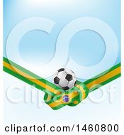 3d Soccer Ball And Tied Brazilian Flag Over Blue