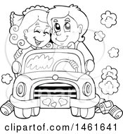 Black And White Wedding Couple Driving In A Car