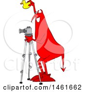 Poster, Art Print Of Chubby Red Devil Photographer Holding A Rubber Duck And Using A Camera On A Tripod
