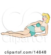 Sexy Blond Woman Wearing A Blue Bikini And Reclining On A Beach In The Summer by Andy Nortnik