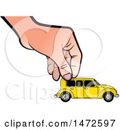 Poster, Art Print Of Hand Moving A Toy Vintage Car
