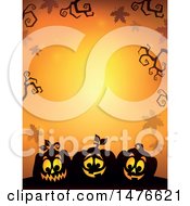 Clipart Of A Halloween Border With Jackolanterns And Bare Branches On Orange Royalty Free Vector Illustration