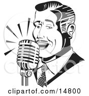 Man Singing Or Announcing Into A Microphone