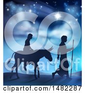 Poster, Art Print Of Silhouetted Scene Of Mary And Joseph On Their Jouney