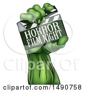 Poster, Art Print Of Green Zombie Hand Holding A Horror Film Night Clapperboard
