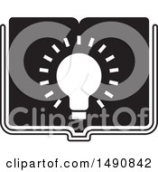 Clipart Of A Black And White Bright Light Bulb On An Open Book Royalty Free Vector Illustration by Lal Perera
