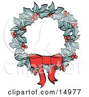 Red Bow On A Christmas Wreath Made Of Holly