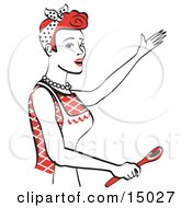 Poster, Art Print Of Happy Red Haired Housewife Or Maid Woman In An Apron Singing And Using A Spoon While Baking In The Kitchen