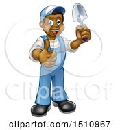 Clipart Of A Full Length Happy Black Male Gardener In Blue Holding A Garden Trowel And Giving A Thumb Up Royalty Free Vector Illustration