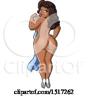 Rear View Of A Nude Sexy Plus Size Black Woman Looking Over Her Shoulder And Holding A Towel