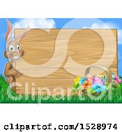 Poster, Art Print Of Happy Brown Easter Bunny Rabbit Pointing Around A Wood Sign Against Sky