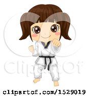 Karate Girl In A Taekwondo Pose