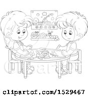 Poster, Art Print Of Black And White Boy And Girl Coloring Pictures At A Table