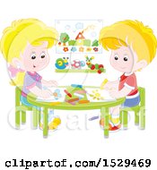 Poster, Art Print Of Happy White Boy And Girl Coloring Pictures At A Table