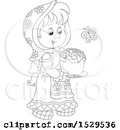 Clipart Of A Black And White Girl Carrying A Cake Royalty Free Vector Illustration